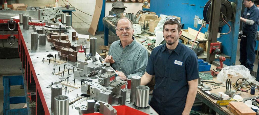 Jeff Brown, Miro Manufacturing owner and president, with his son Aaron Brown, an employee at the company.