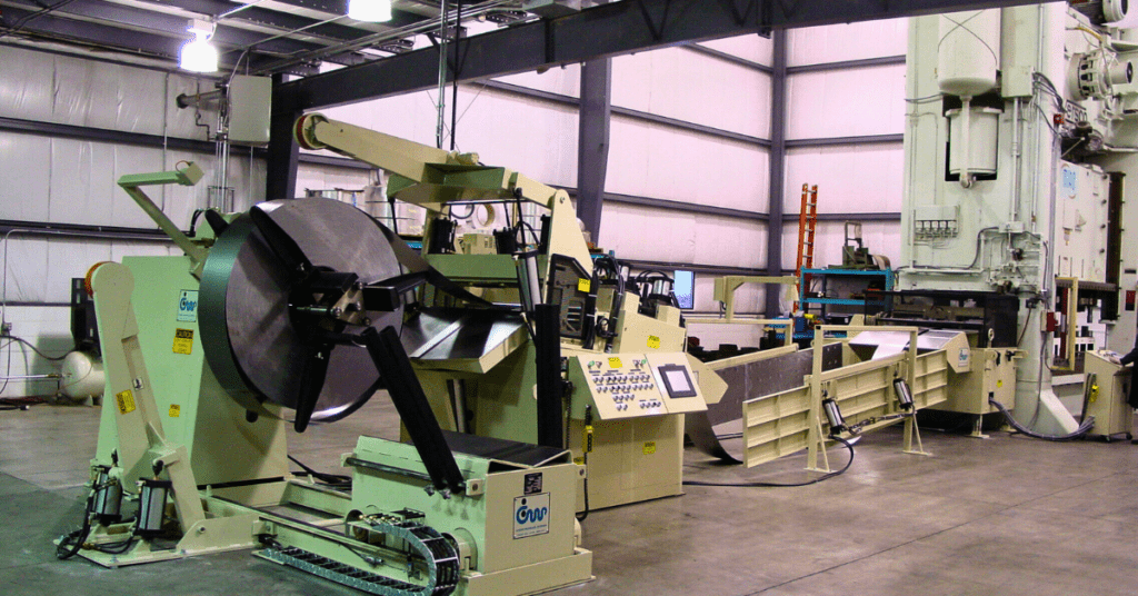State-of-the-art contract manufacturing solutions at Miro Manufacturing, featuring an automated metal stamping line with coil feeder and high-tonnage press.