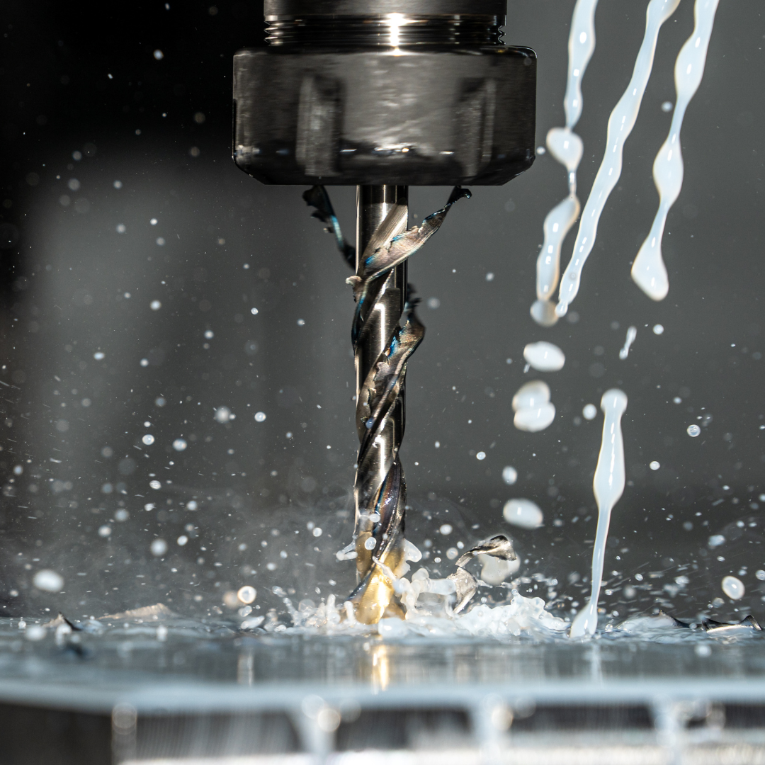 Close Up Photo of a CNC Milling Machine with Metalworking Fluid