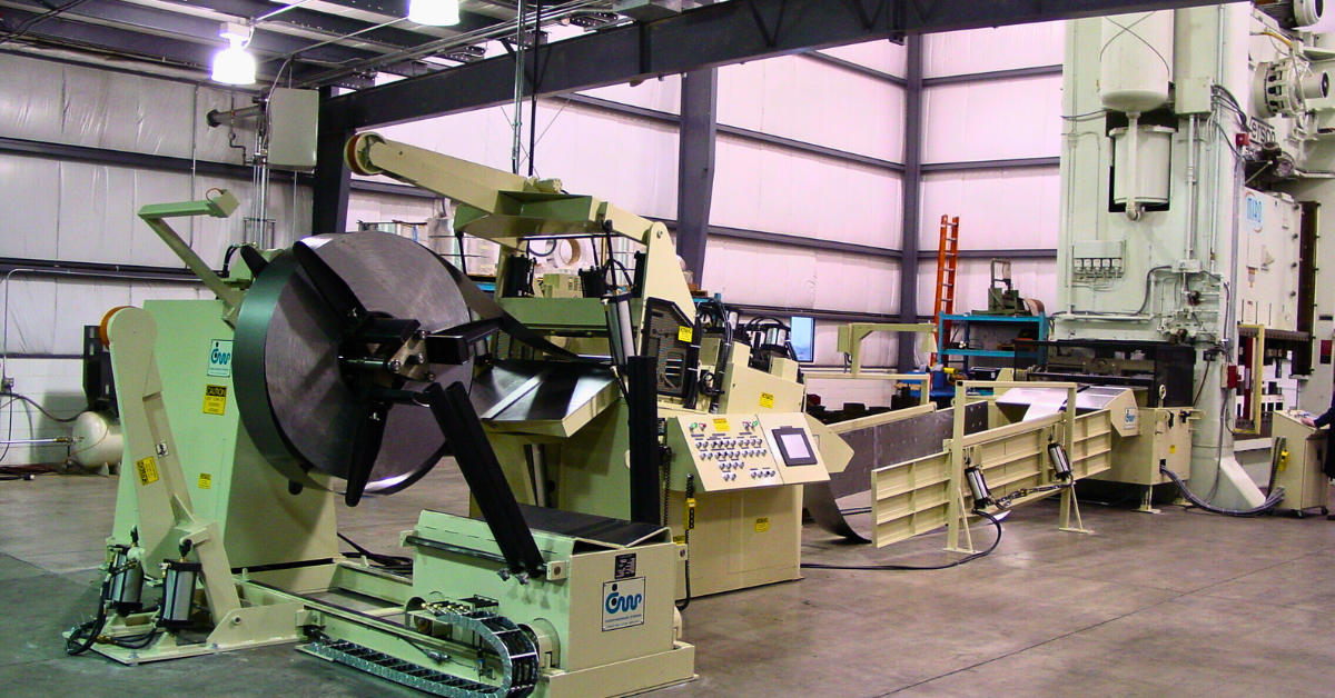 State-of-the-art contract manufacturing solutions at Miro Manufacturing, featuring an automated metal stamping line with coil feeder and high-tonnage press.